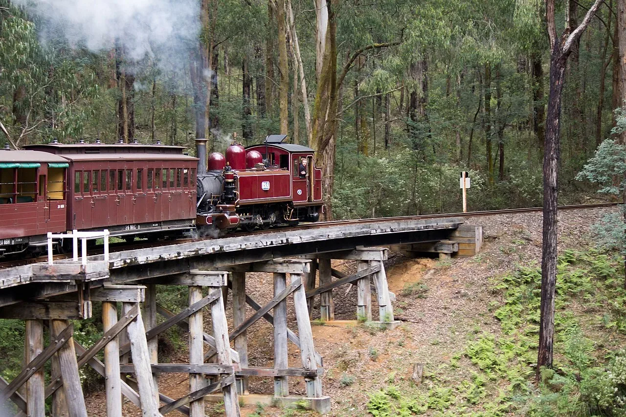 Puffing Billy steam train crossing a trestle bridge in the Dandenong Ranges